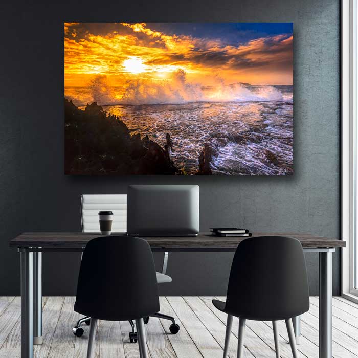 Sunrise and Crashing Waves on Rocks