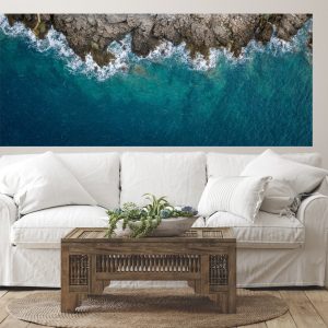 Peel and Stick Prints | Wallpaper featuring ocean waves and rocky shoreline in modern coastal living room